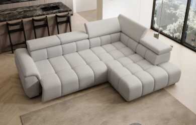 szary narożnik z wysuwanym siedziskiem i regulowanymi zagłówkami do salonu