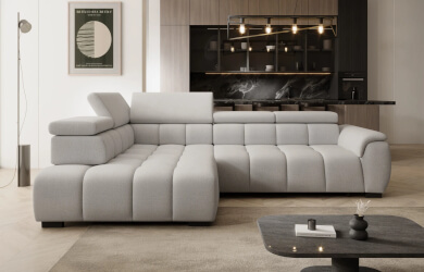 szary narożnik z wysuwanym siedziskiem i regulowanymi zagłówkami