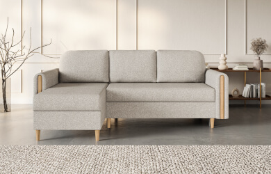 szary narożnik w kształcie litery L, posiada funkcję spania i pojemnik na pościel