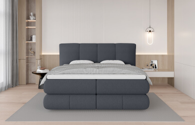 tapicerowane łóżko kontynentalne z dwoma materacami i dekoracyjnie przeszywanym zagłówkiem