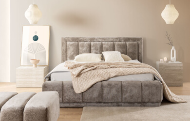 szare łóżko tapicerowane do sypialni