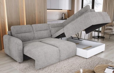 szary narożnik do salonu w kształcie litery L, z funkcją wysuwanego oparcia i pojemnikiem