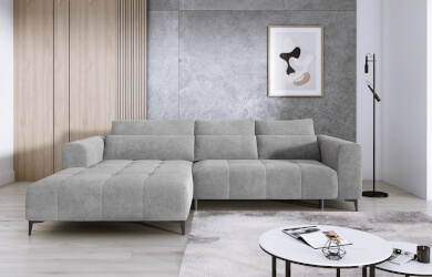 szary narożnik z podszkami ledziwowymi do salonu, typ L, wysuwane elektrycznie siedzisko