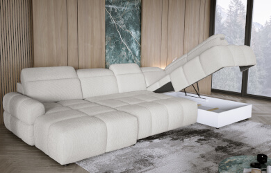 nowoczesny naroznik w kształcie litery U, w jasnym kolorze, z regulowanymi zagłówkami i wysuwanym elektrycznie siedziskiem, posiada pojemnik na pościel