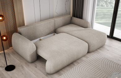 nowoczesny narożnik o zablonych kształtach do salonu, z pojemniekiem na pościel i funkcją spnia codziennego typu DL