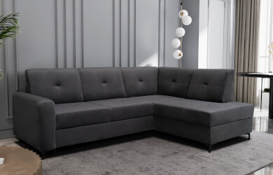 nowoczesny naroznik na czanych nóżkach z funckją spania i pojemnikiem na posciel