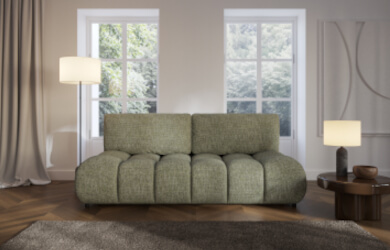 zielona sofa Moko z przeszyciami na siedzisku i dwoma poduchami oparciowymi